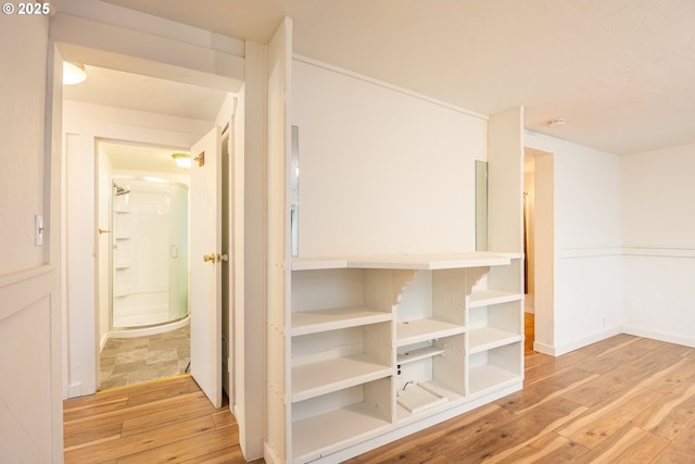 hall featuring light hardwood / wood-style floors