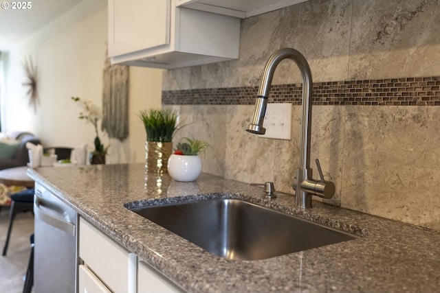 1745 NW Lakeway Ln, Beaverton, OR 97006 - kitchen with a sink, dark stone counters, white cabinetry, tasteful backsplash, and dishwasher