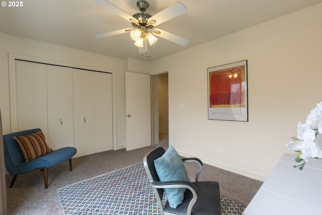 interior space featuring carpet flooring and ceiling fan