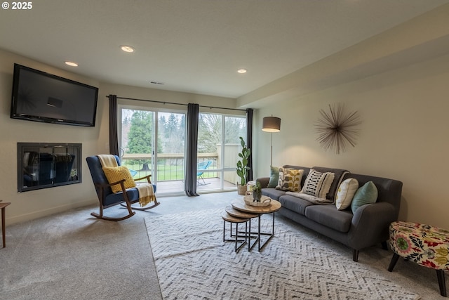 1745 NW Lakeway Ln, Beaverton, OR 97006 - carpeted living area with a glass covered fireplace, recessed lighting, and baseboards