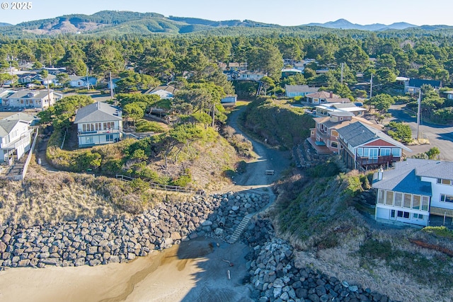 320 El Rotundo Ave, Lincoln City, OR 97367 - aerial perspective of suburban area with a mountainous background