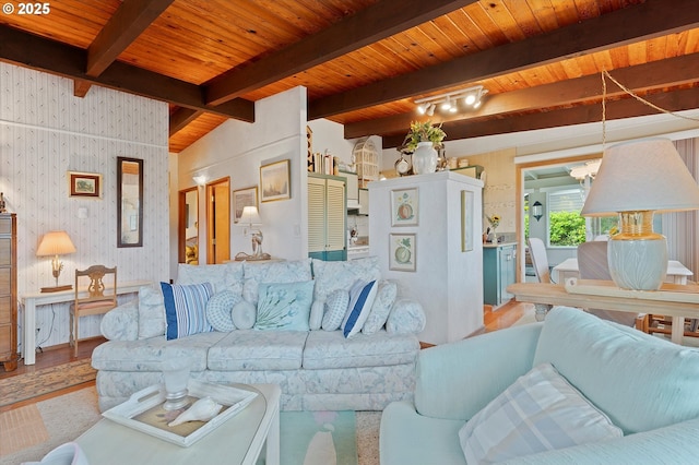 320 El Rotundo Ave, Lincoln City, OR 97367 - living area featuring wood finished floors, wood ceiling, a chandelier, and wallpapered walls