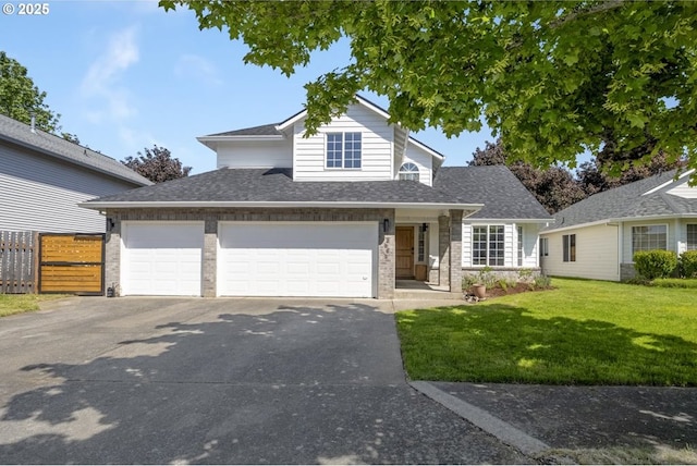 2005 SW Stella Way, Troutdale, OR 97060 - traditional-style home with asphalt driveway, a shingled roof, and an attached garage