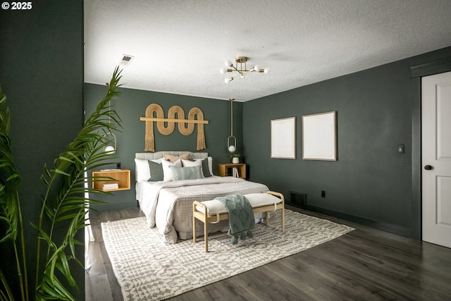 2005 SW Stella Way, Troutdale, OR 97060 - bedroom featuring a chandelier, wood finished floors, and a textured ceiling