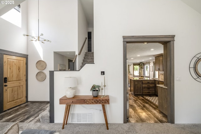 2005 SW Stella Way, Troutdale, OR 97060 - foyer entrance featuring dark wood finished floors, stairway, recessed lighting, and a chandelier
