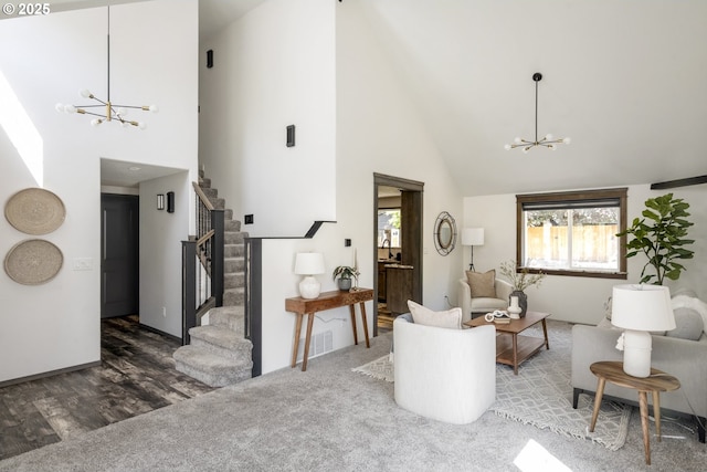 2005 SW Stella Way, Troutdale, OR 97060 - living area featuring a chandelier, high vaulted ceiling, stairs, and wood finished floors