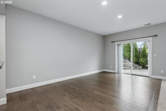 7698 NW Catalpa St, Portland, OR 97229 - spare room featuring baseboards, dark wood-type flooring, and recessed lighting