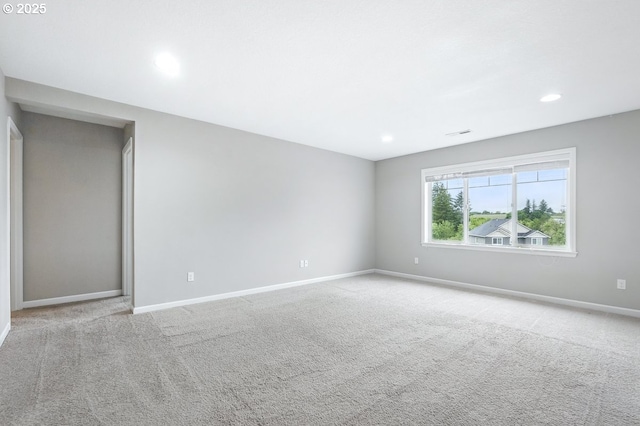 7698 NW Catalpa St, Portland, OR 97229 - spare room featuring baseboards, carpet flooring, and recessed lighting