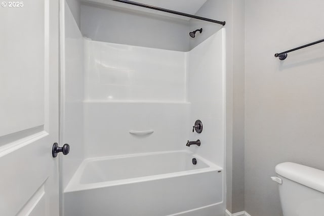 7698 NW Catalpa St, Portland, OR 97229 - bathroom with toilet, bathing tub / shower combination, and baseboards