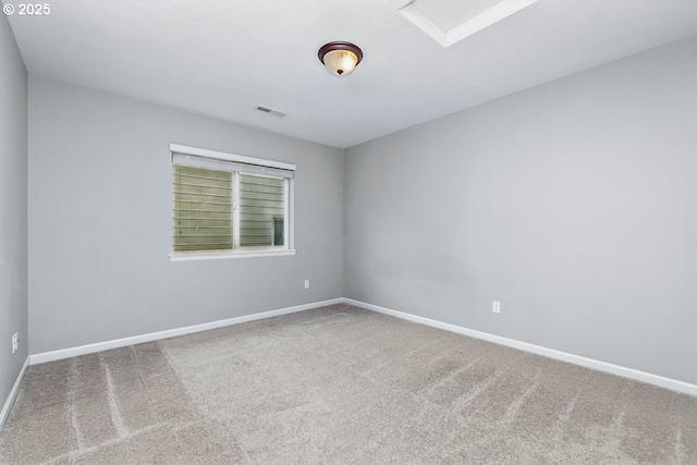 7698 NW Catalpa St, Portland, OR 97229 - carpeted empty room with baseboards