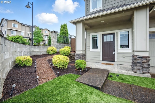 7698 NW Catalpa St, Portland, OR 97229 - property entrance with a residential view
