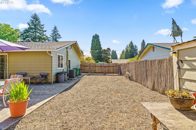 3131 Alyndale Dr, Eugene, OR 97404 - fenced backyard with a patio area and central AC
