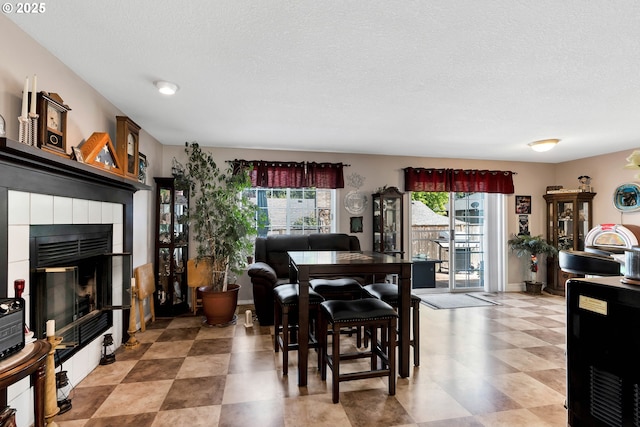 10903 NW 5th Ave, Vancouver, WA 98685 - dining room with a fireplace and a textured ceiling