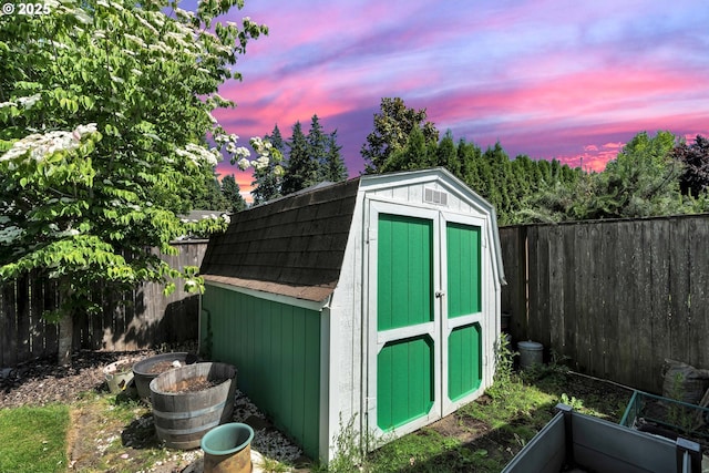10903 NW 5th Ave, Vancouver, WA 98685 - outdoor structure at dusk featuring a storage shed and a fenced backyard