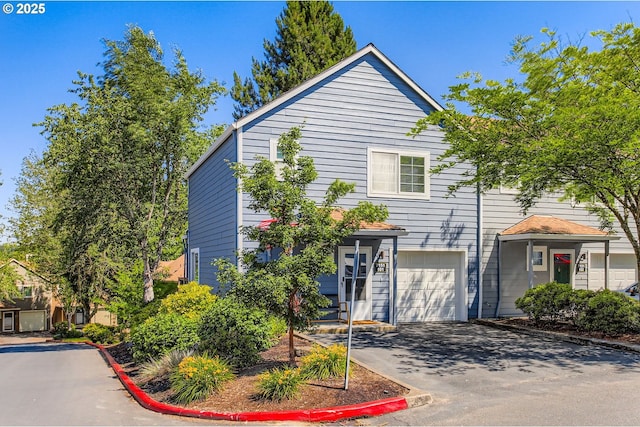 7151 SW Sagert St Unit 101, Tualatin, OR 97062 - multi unit property with an attached garage and driveway