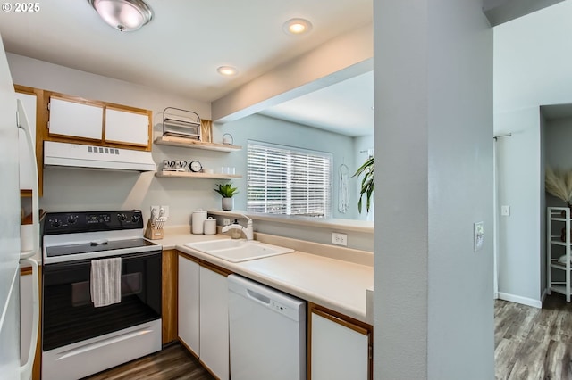 7151 SW Sagert St Unit 101, Tualatin, OR 97062 - kitchen featuring electric range oven, white dishwasher, ventilation hood, light countertops, and white cabinets