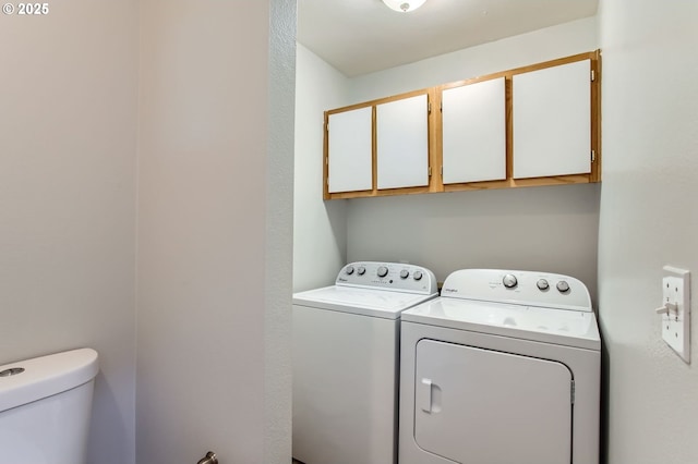 7151 SW Sagert St Unit 101, Tualatin, OR 97062 - washroom with separate washer and dryer and cabinet space