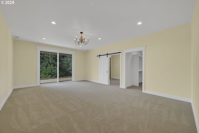 83594 Sauter Dr, Florence, OR 97439 - unfurnished bedroom featuring a chandelier, light carpet, baseboards, and recessed lighting