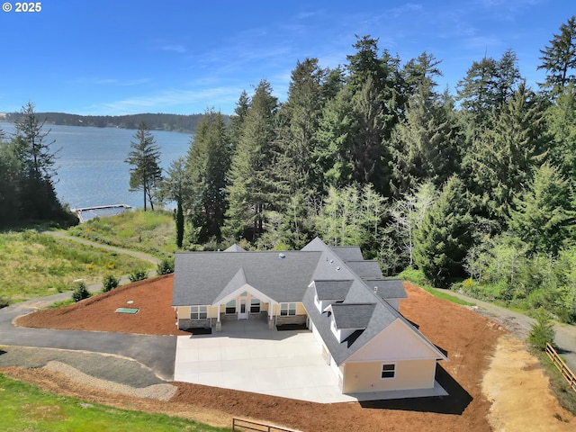 83594 Sauter Dr, Florence, OR 97439 - view from above of property featuring a nearby body of water and a heavily wooded area