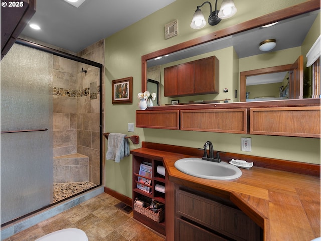 24880 E Arrah Wanna Blvd, Welches, OR 97067 - full bath featuring a shower stall, baseboards, and vanity