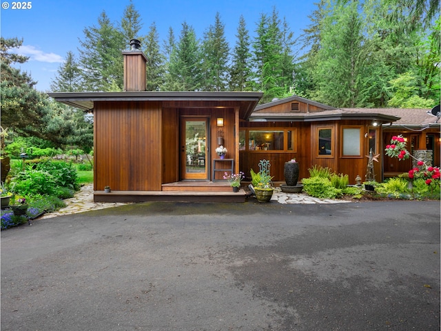 24880 E Arrah Wanna Blvd, Welches, OR 97067 - view of front of home with a chimney