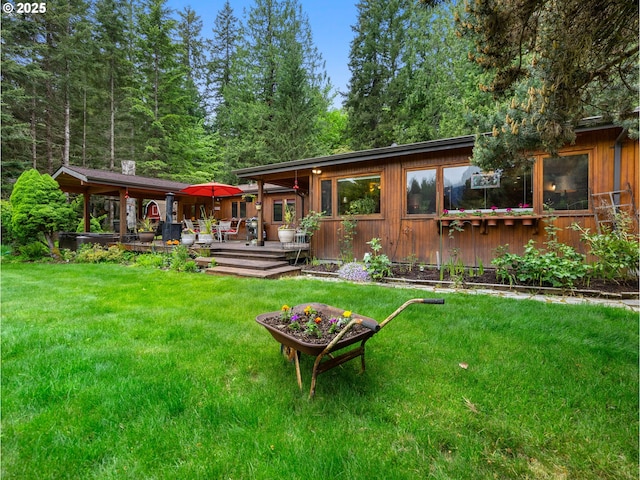 24880 E Arrah Wanna Blvd, Welches, OR 97067 - back of property with a lawn and a deck