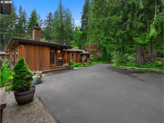 24880 E Arrah Wanna Blvd, Welches, OR 97067 - view of front facade with a chimney