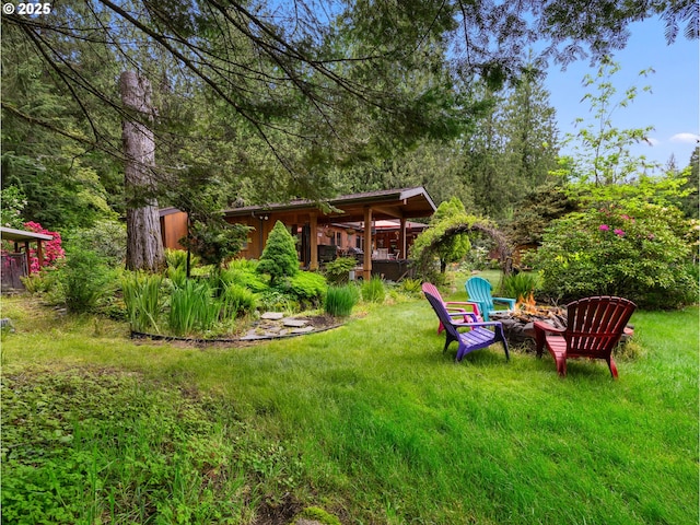 24880 E Arrah Wanna Blvd, Welches, OR 97067 - view of green lawn with a fire pit