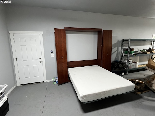 78115 Giger Ln, Weston, OR 97886 - bedroom featuring concrete floors and baseboards
