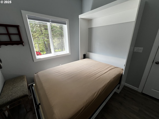 78115 Giger Ln, Weston, OR 97886 - bedroom with dark wood-style floors and baseboards