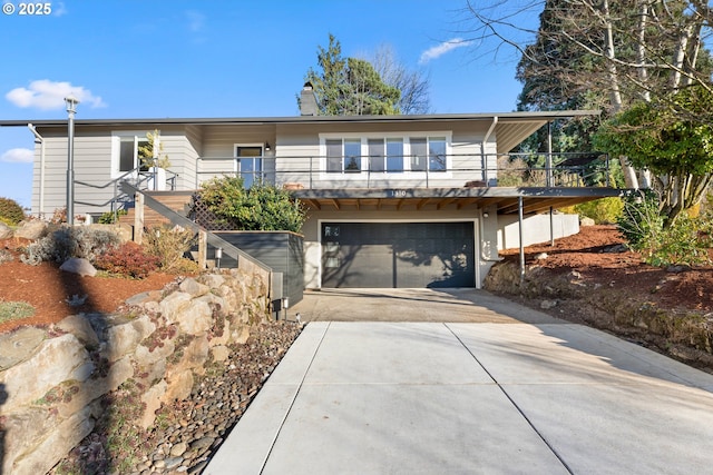 view of front of property with a garage