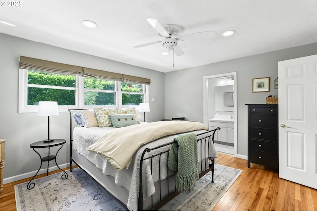 819 SE 98th Ave, Vancouver, WA 98664 - bedroom with light wood-style floors, recessed lighting, connected bathroom, and a ceiling fan