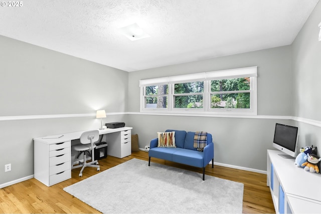 819 SE 98th Ave, Vancouver, WA 98664 - home office featuring wood finished floors and a textured ceiling