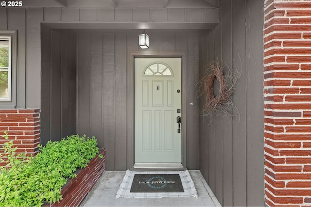 819 SE 98th Ave, Vancouver, WA 98664 - doorway to property with brick siding and board and batten siding