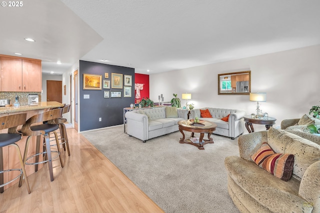 10795 SE 93rd Ct, Happy Valley, OR 97086 - living room with recessed lighting, light wood-type flooring, and baseboards