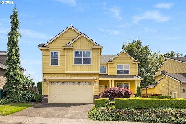 craftsman-style home with a garage