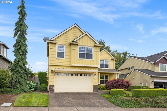 view of front of property with a garage