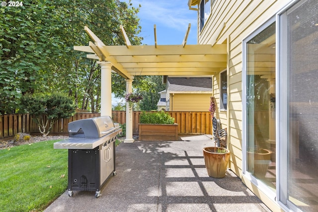 view of patio featuring grilling area and a pergola