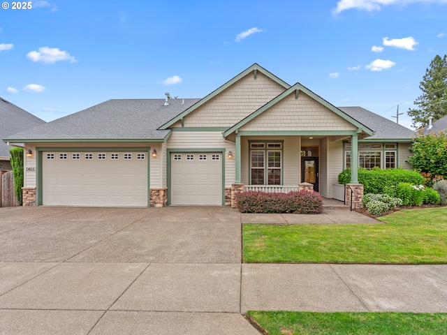 1466 NE 15th Ave, Canby, OR 97013 - view of front of property with a garage, a porch, driveway, and stone siding