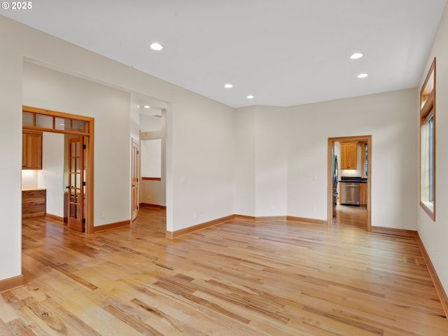1466 NE 15th Ave, Canby, OR 97013 - unfurnished room featuring light wood-style flooring and recessed lighting