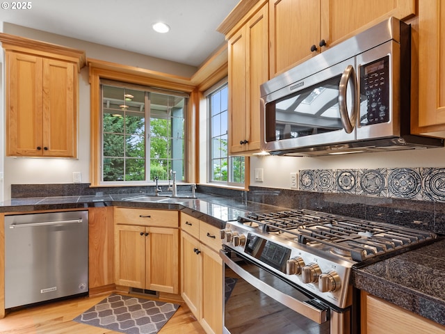 1466 NE 15th Ave, Canby, OR 97013 - kitchen with appliances with stainless steel finishes, tile countertops, light wood-type flooring, and recessed lighting