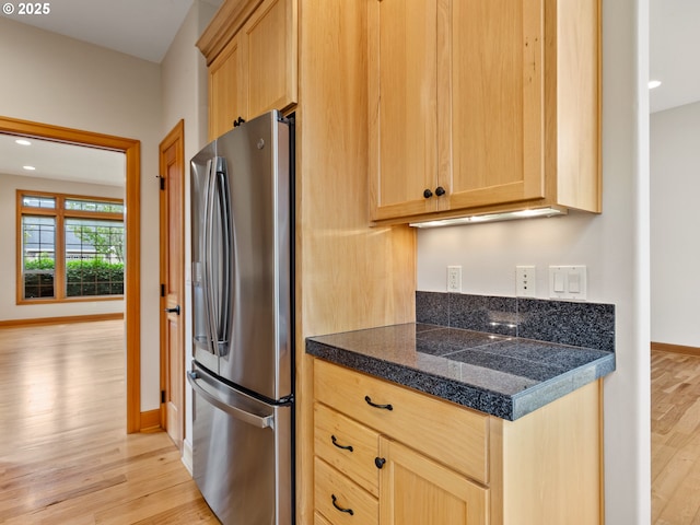 1466 NE 15th Ave, Canby, OR 97013 - kitchen featuring freestanding refrigerator, tile counters, light wood-type flooring, light brown cabinets, and recessed lighting