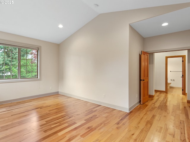 1466 NE 15th Ave, Canby, OR 97013 - empty room featuring lofted ceiling, light wood-style floors, recessed lighting, and a smoke detector