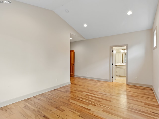 1466 NE 15th Ave, Canby, OR 97013 - spare room featuring lofted ceiling, light wood finished floors, and recessed lighting