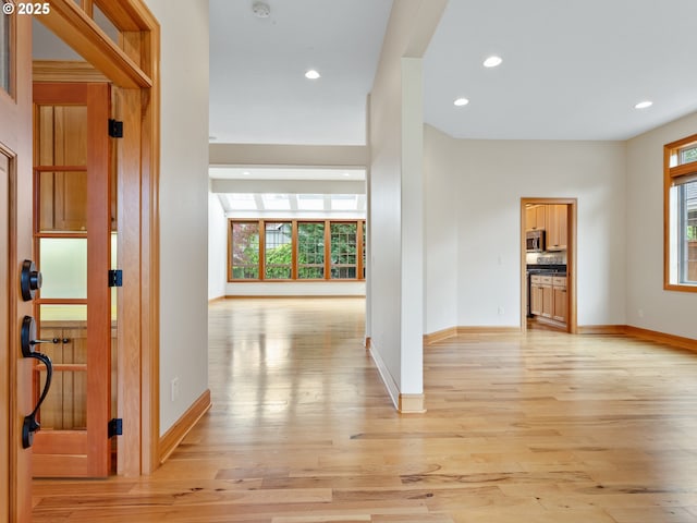 1466 NE 15th Ave, Canby, OR 97013 - hall featuring light wood finished floors and recessed lighting