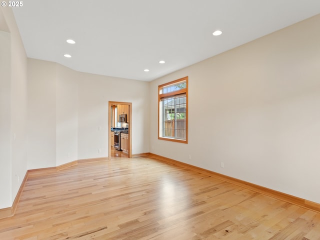 1466 NE 15th Ave, Canby, OR 97013 - spare room with light wood finished floors and recessed lighting