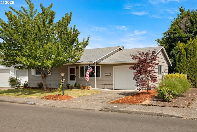 15870 SW Royalty Pkwy, King City, OR 97224 - view of front of house with a garage, roof with shingles, and driveway