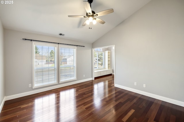 16405 NE 38th St, Vancouver, WA 98682 - spare room with baseboards, wood finished floors, a ceiling fan, and high vaulted ceiling