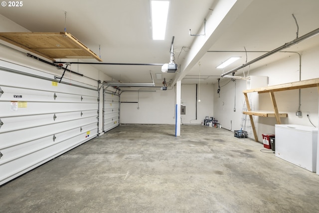 16405 NE 38th St, Vancouver, WA 98682 - garage featuring fridge and a garage door opener