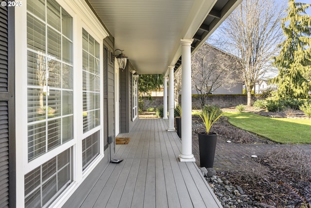 wooden deck featuring covered porch